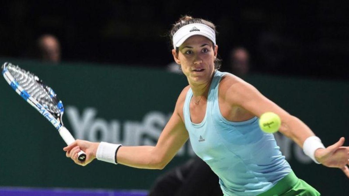Garbine Muguruza, durante su partido contra Karolina Pliskova en Singapur.-AFP / ROSLAN RAHMAN