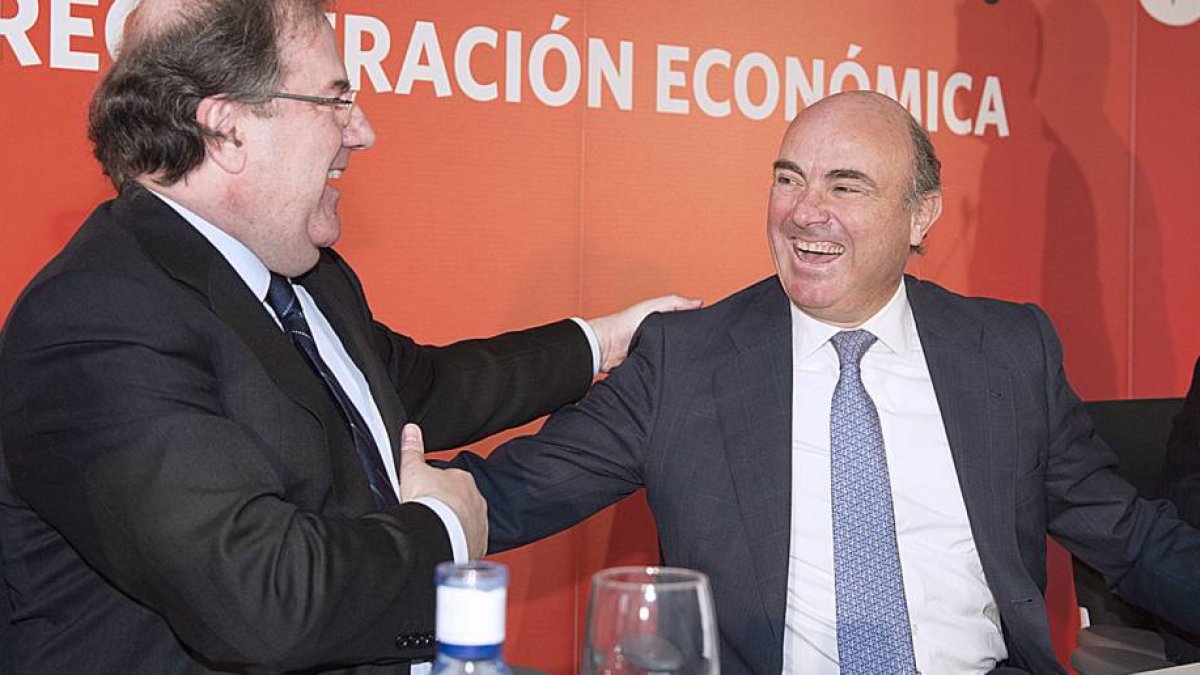 Juan Vicente Herrera y Luis de Guindos.-Ical