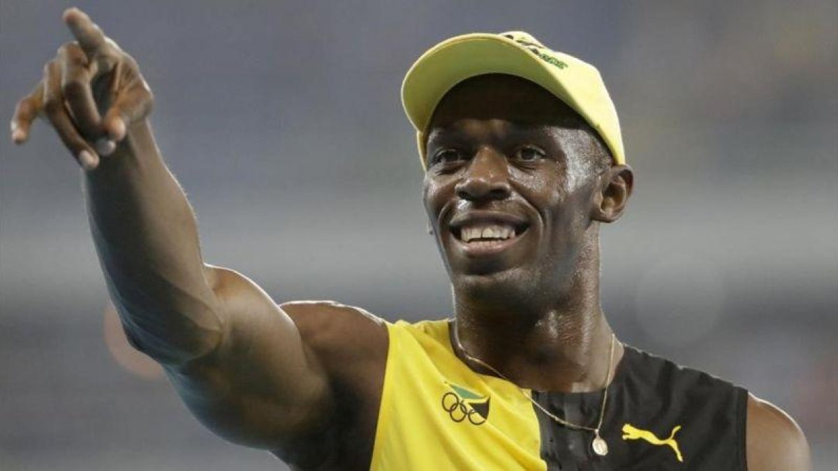 Bolt celebra su medalla de oro olímpico en Río de Janeiro.-AP / DAVID GOLDMAN