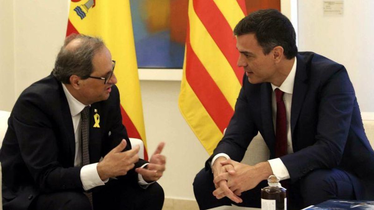 Torra y Sánchez, el pasado julio en la Moncloa.-DAVID CASTRO