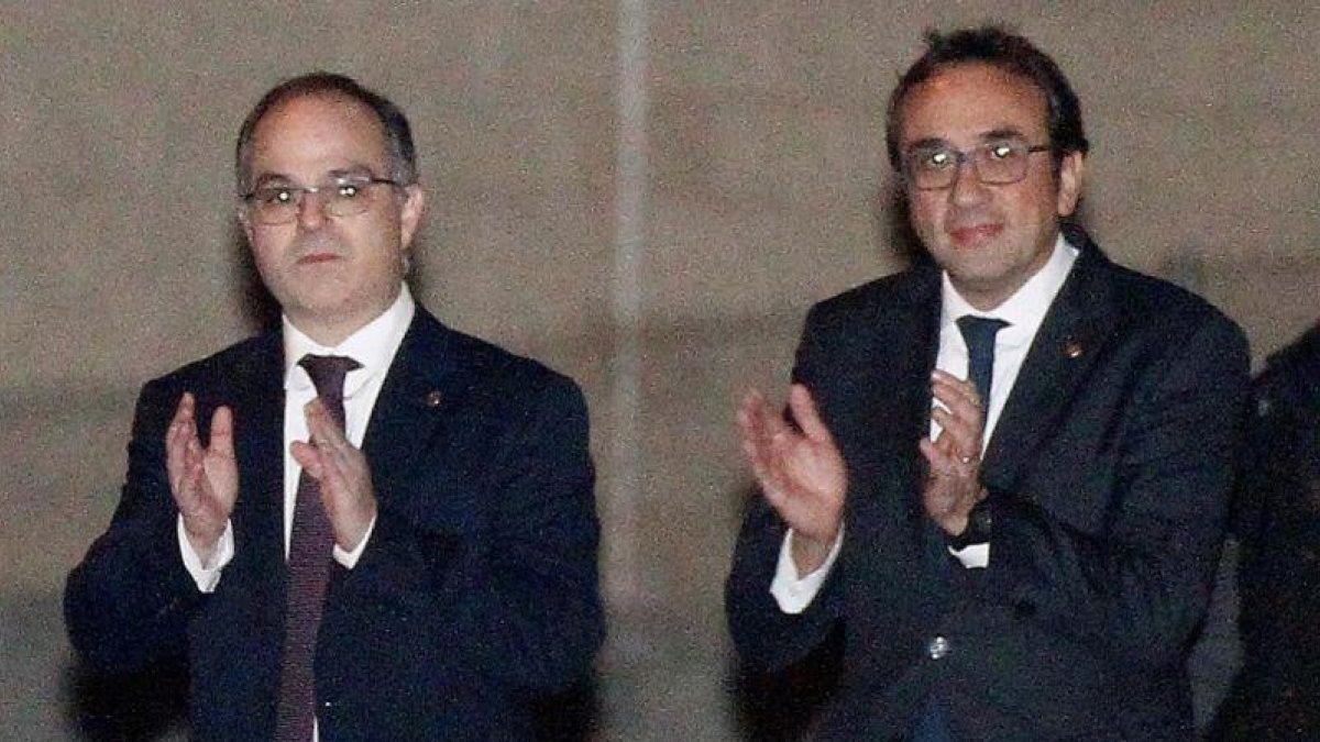 Jordi Turull y Josep Rull, a su salida de la prisión de Estremera.-VICTOR LERENA (EFE)