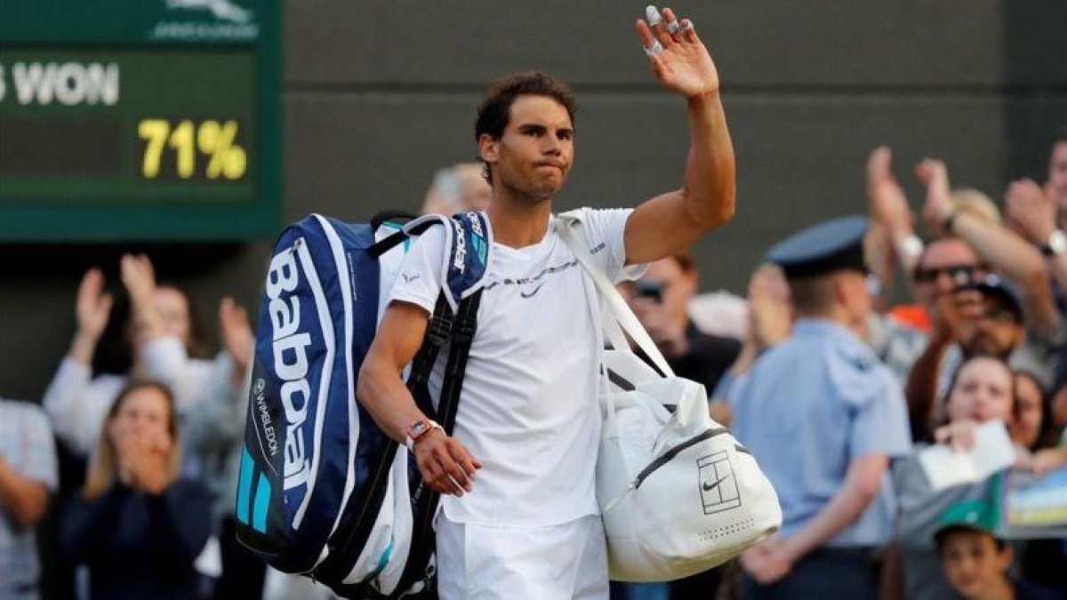 Nadal se despide de Wimbledon, tras perder con Muller.-REUTERS / MATTHEW CHILDS