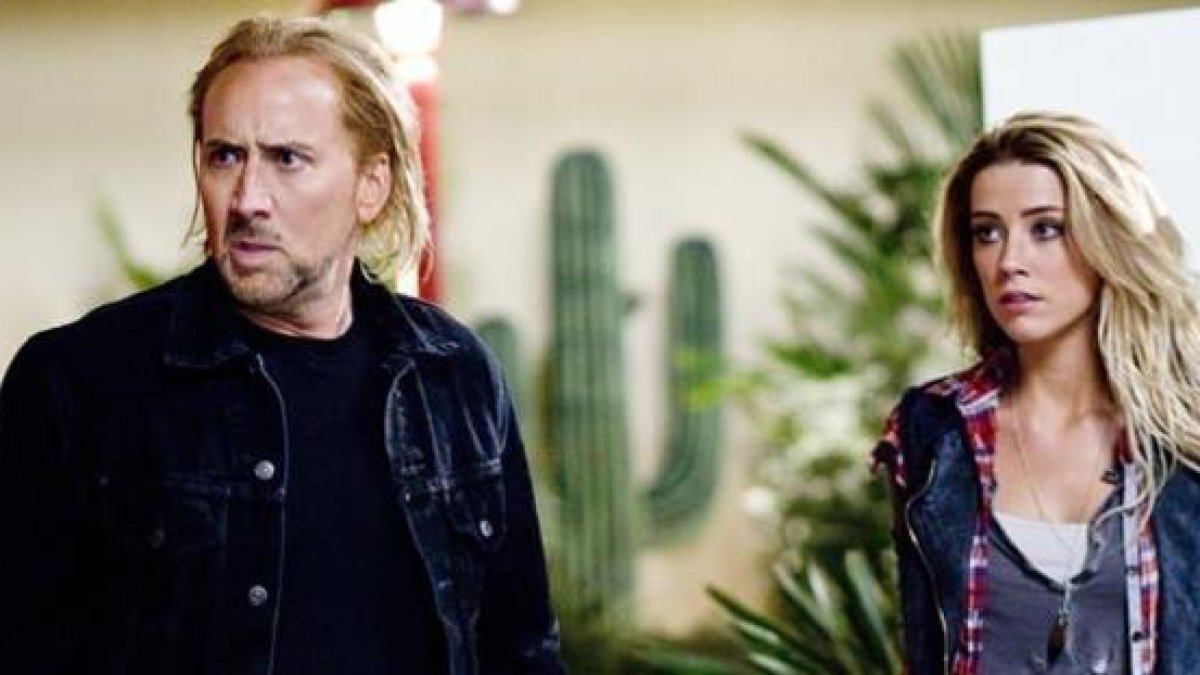Nicolas Cage y Amber Heard, en la película 'Furia ciega'.-ARCHIVO