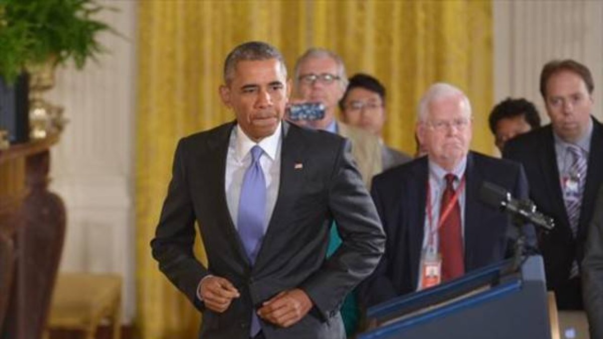 Obama se dispone a iniciar su rueda de prensa sobre el pacto nuclear con Irán en la Casa Blanca, en Washington, este miércoles.-