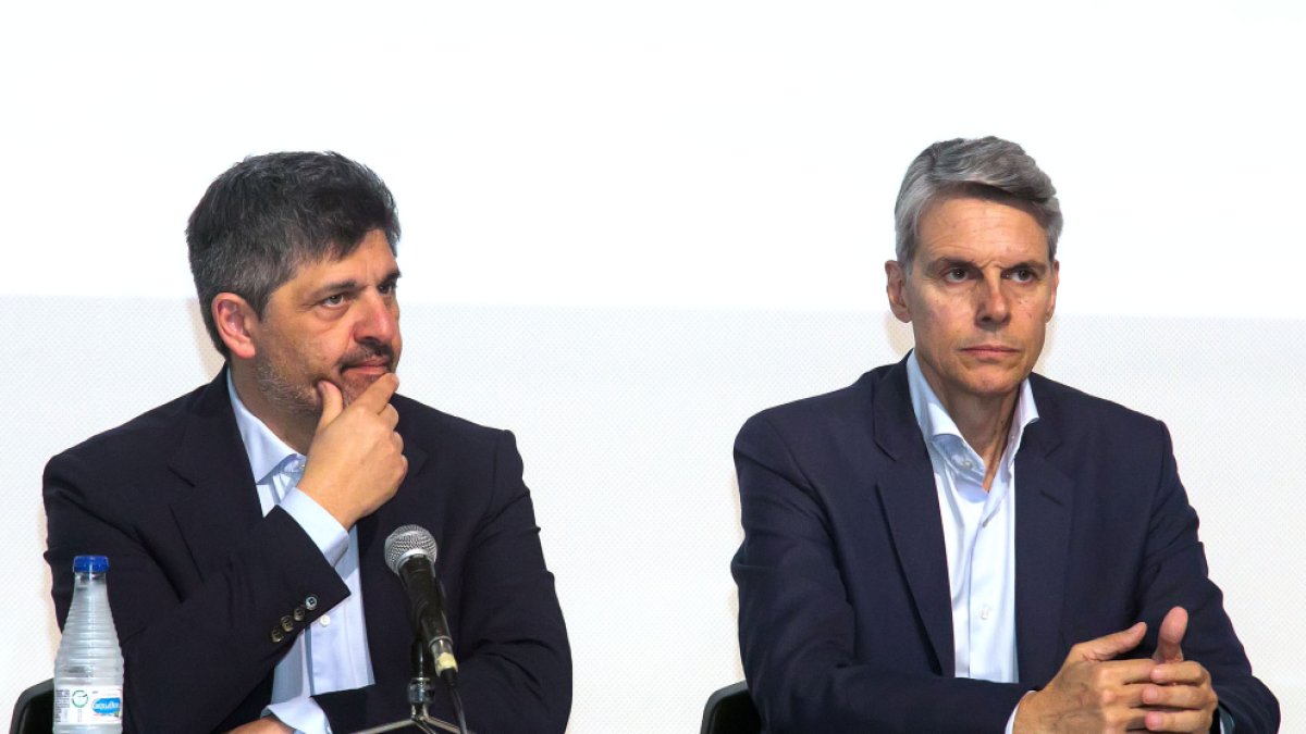 Figoli y Grandinetti, durante la Junta General de Accionistas celebrada en julio.