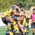 Los jugadores del UBUColina Clinic celebran el ensayo de Salas.-ISRAEL L. MURILLO