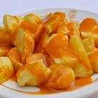 Imagen de las típicas patatas bravas del Meson Burgos cuya receta tiene más de 60 años